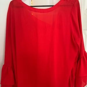 Red blouse with bell sleeves
